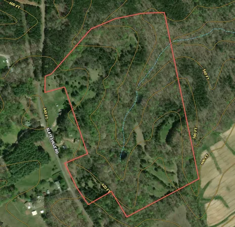 a view of outdoor space with lots of trees