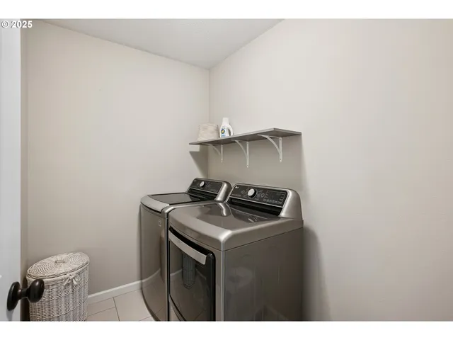 a bathroom with a granite countertop sink a toilet