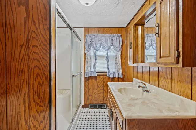 a view of a room with a large window