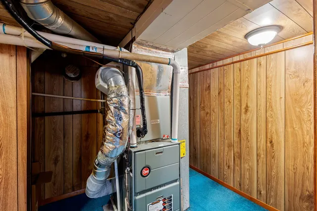 a view of a electric appliances in kitchen and empty room