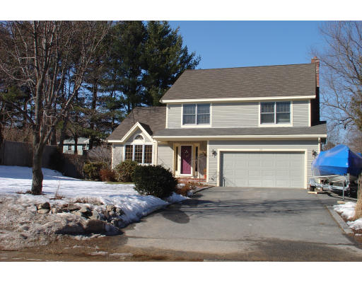 397 Linebrook Road Ipswich, MA 01938 - Photo 2 of 5 a front view of a house with a yard