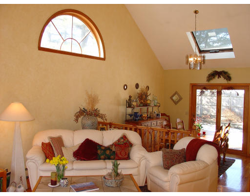 397 Linebrook Road Ipswich, MA 01938 - Photo 3 of 5 a living room with furniture and a window