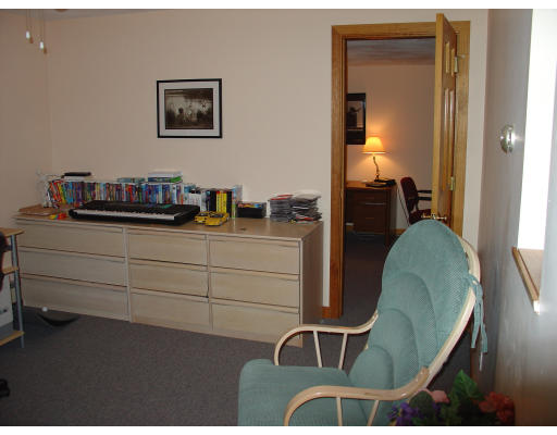 397 Linebrook Road Ipswich, MA 01938 - Photo 5 of 5 a bedroom with a bed and a dresser