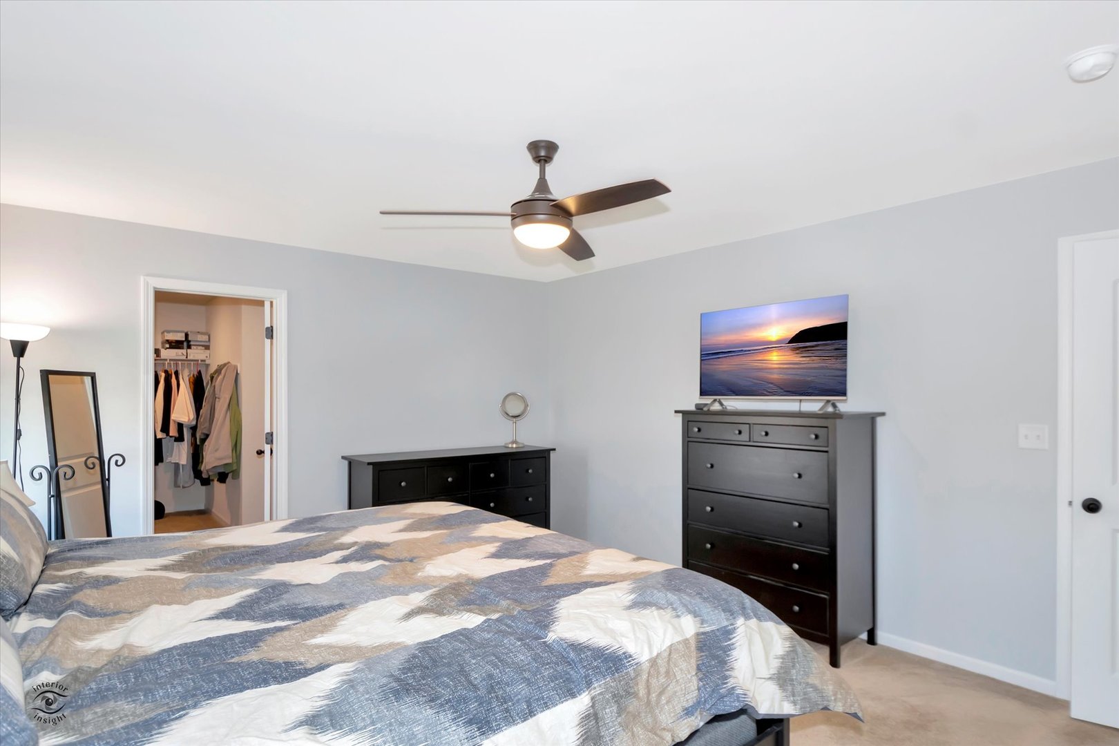 1721 Eagle Ct. Morris, IL 60450 - Photo 12 of 27 a bedroom with a bed and a chandelier