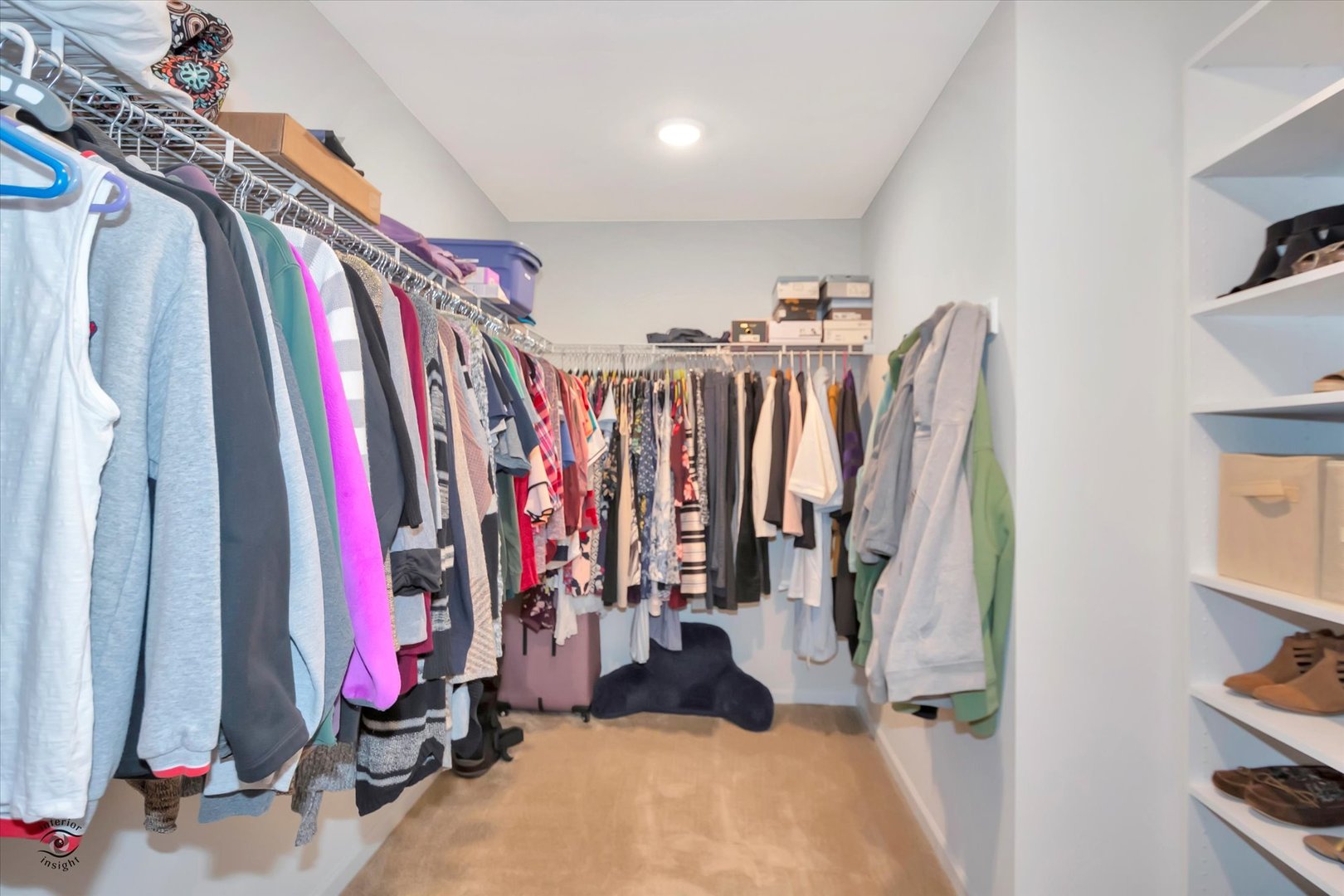 1721 Eagle Ct. Morris, IL 60450 - Photo 14 of 27 a view of walk in closet with clothes