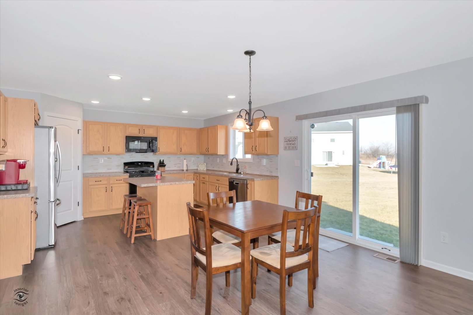 1721 Eagle Ct. Morris, IL 60450 - Photo 4 of 27 a dining room with furniture and wooden floor
