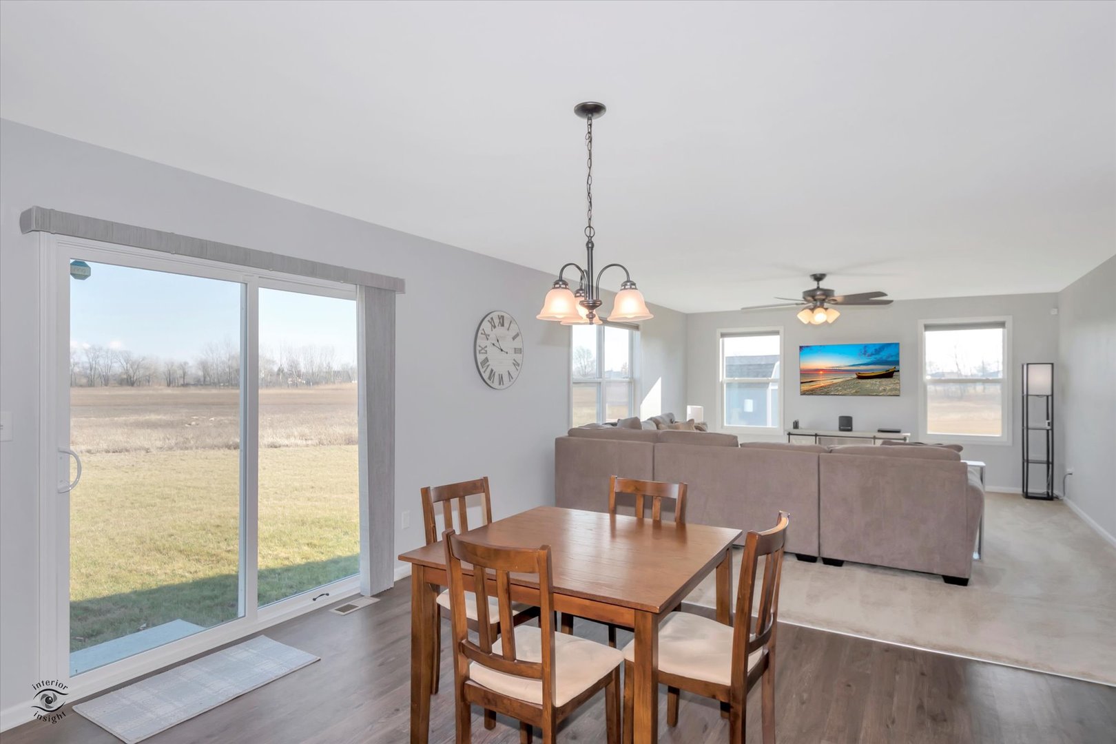 1721 Eagle Ct. Morris, IL 60450 - Photo 7 of 27 a living room with furniture and a chandelier