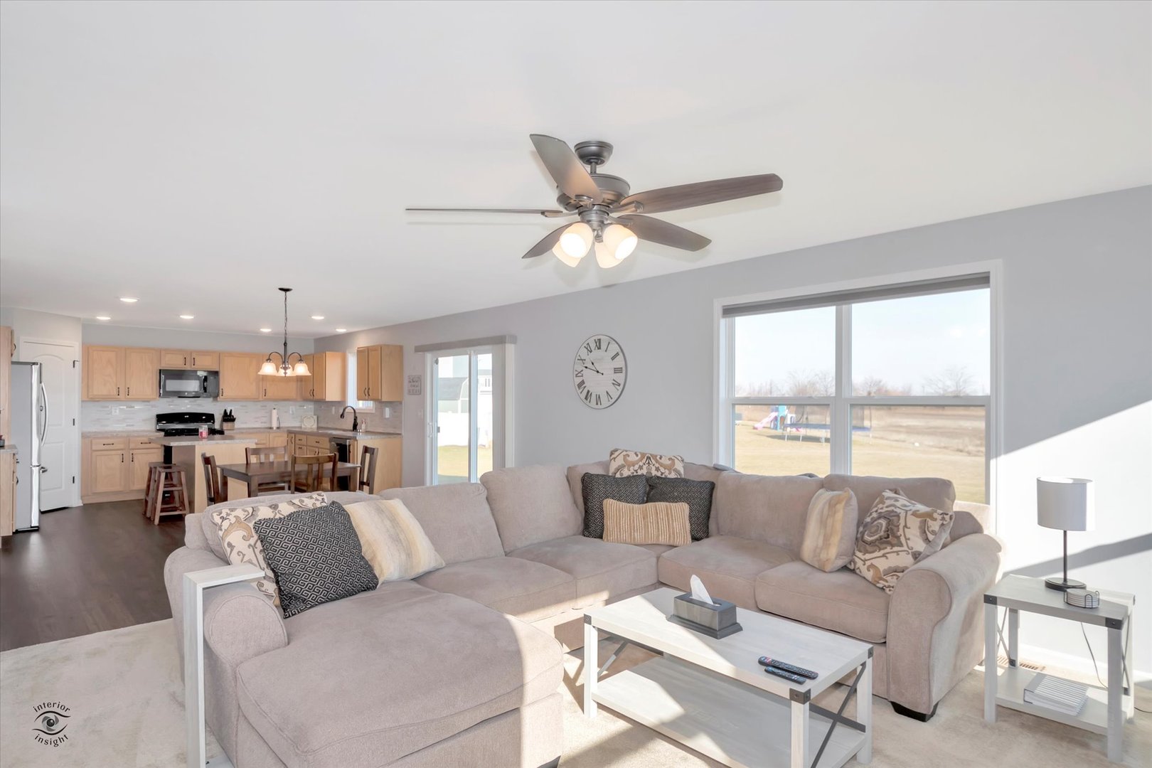 1721 Eagle Ct. Morris, IL 60450 - Photo 10 of 27 a living room with furniture or couches and a large window