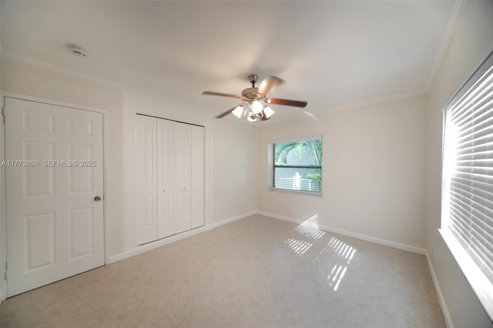 621 Hudson Road West Palm Beach, FL 33405 - Photo 13 of 27 a view of an empty room with a window