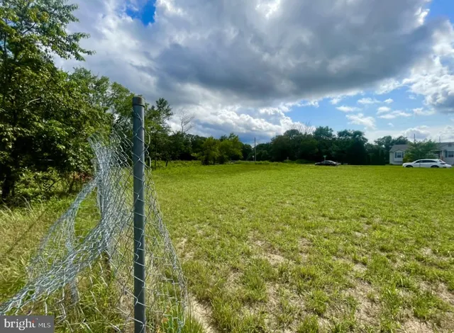 a view of a lake from a yard