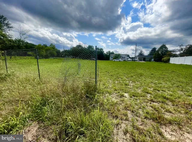 a view of a golf course with a swimming pool