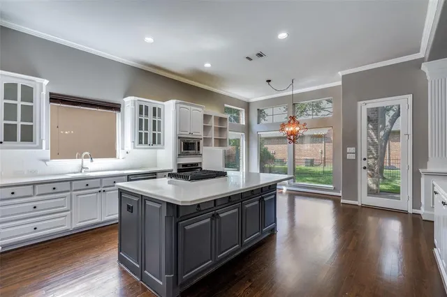 a view of an entryway with a wooden door
