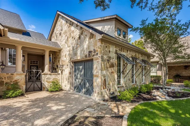 a backyard of a house with yard and outdoor seating