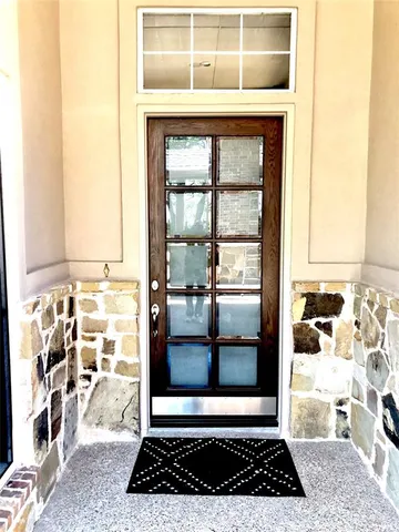 a view of a entryway door of the house