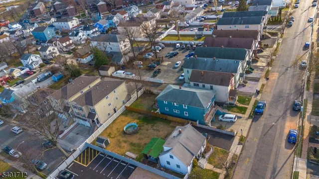 an aerial view of a city with lots of residential buildings
