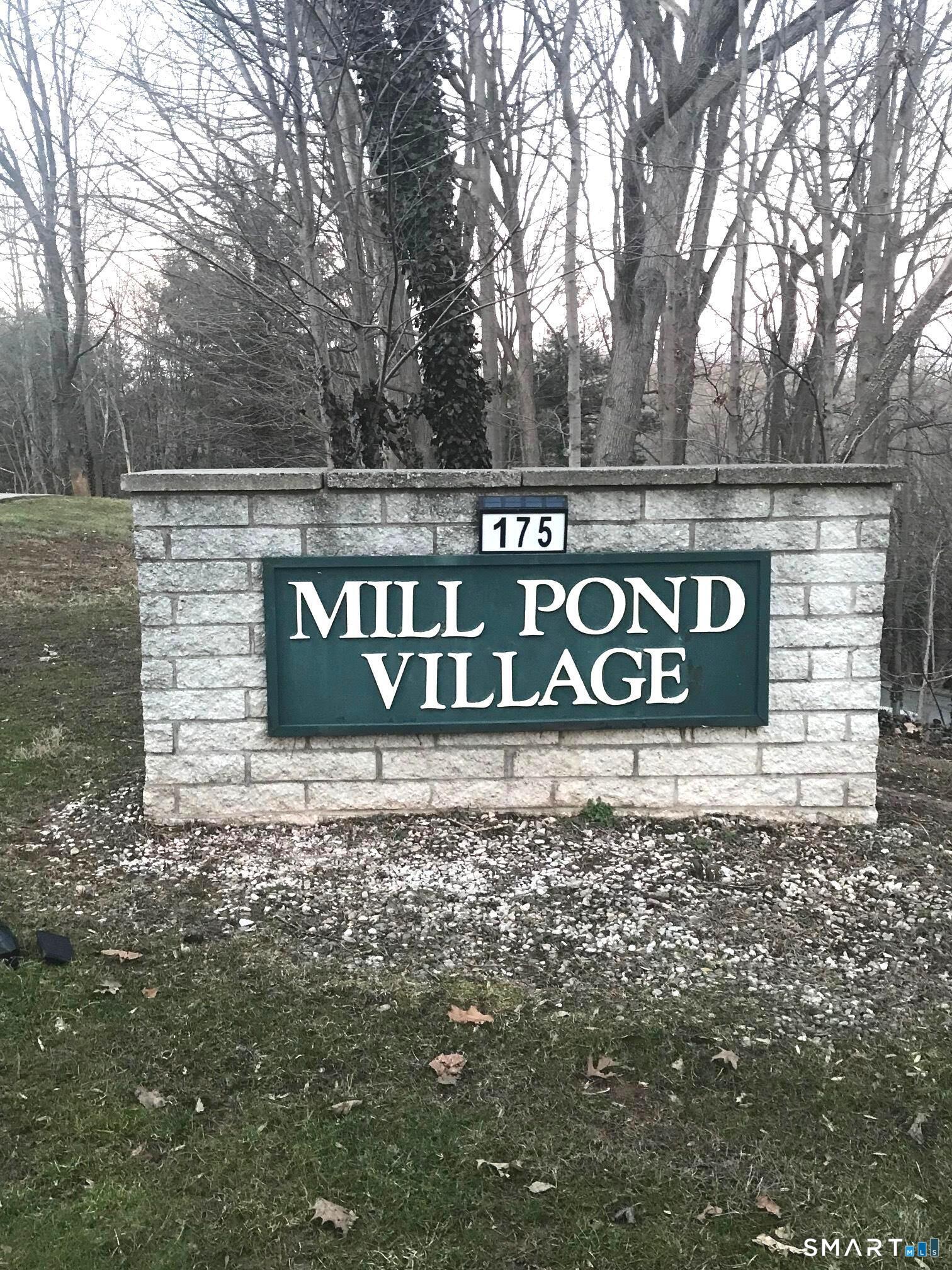 175 Mill Pond Road, Unit 346 Hamden, CT 06514 - Photo 1 of 18 a view of outdoor space with sign board