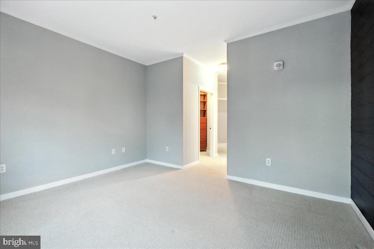 8045 Newell Street, Unit 301 Silver Spring, MD 20910 - Photo 11 of 19 a view of an empty room