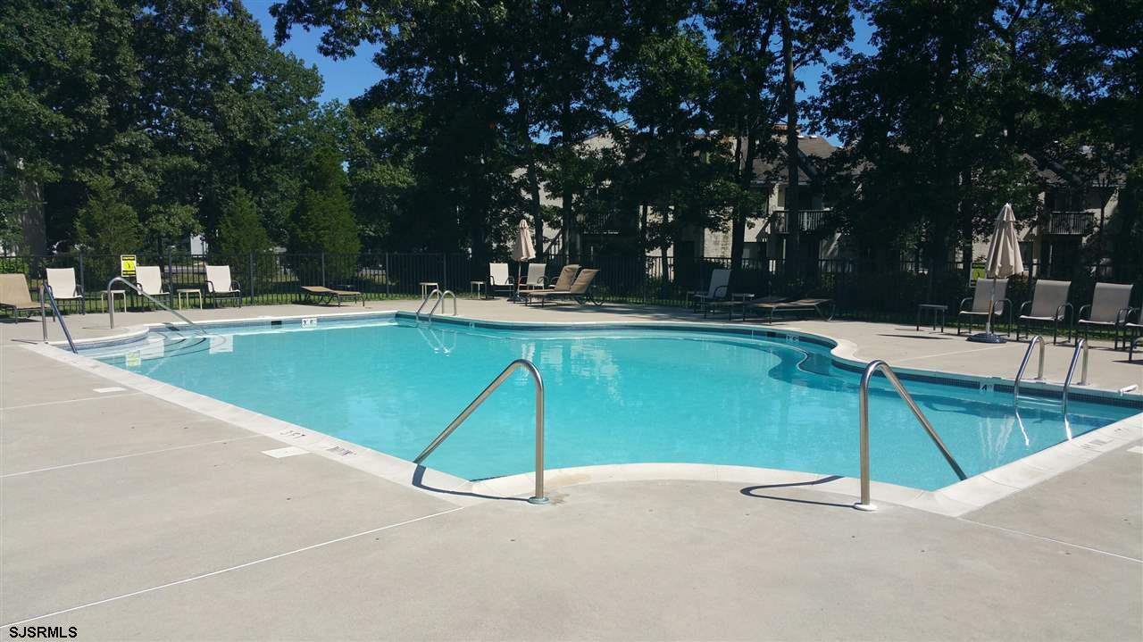 54 White Pond Court Galloway Township, NJ 08205 - Photo 10 of 13 a view of swimming pool with chairs