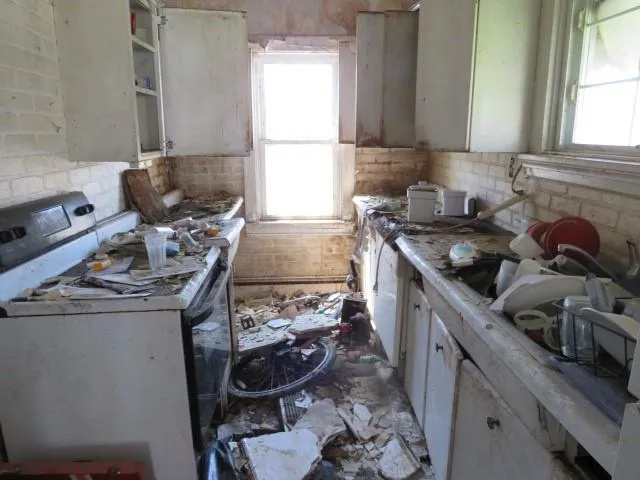 a kitchen with a stove and a sink