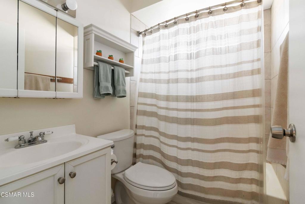 705 Wishard Avenue Simi Valley, CA 93065 - Photo 17 of 50 a bathroom with a sink toilet and shower