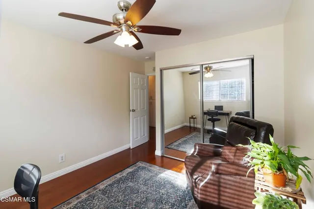 a workspace with furniture and a window