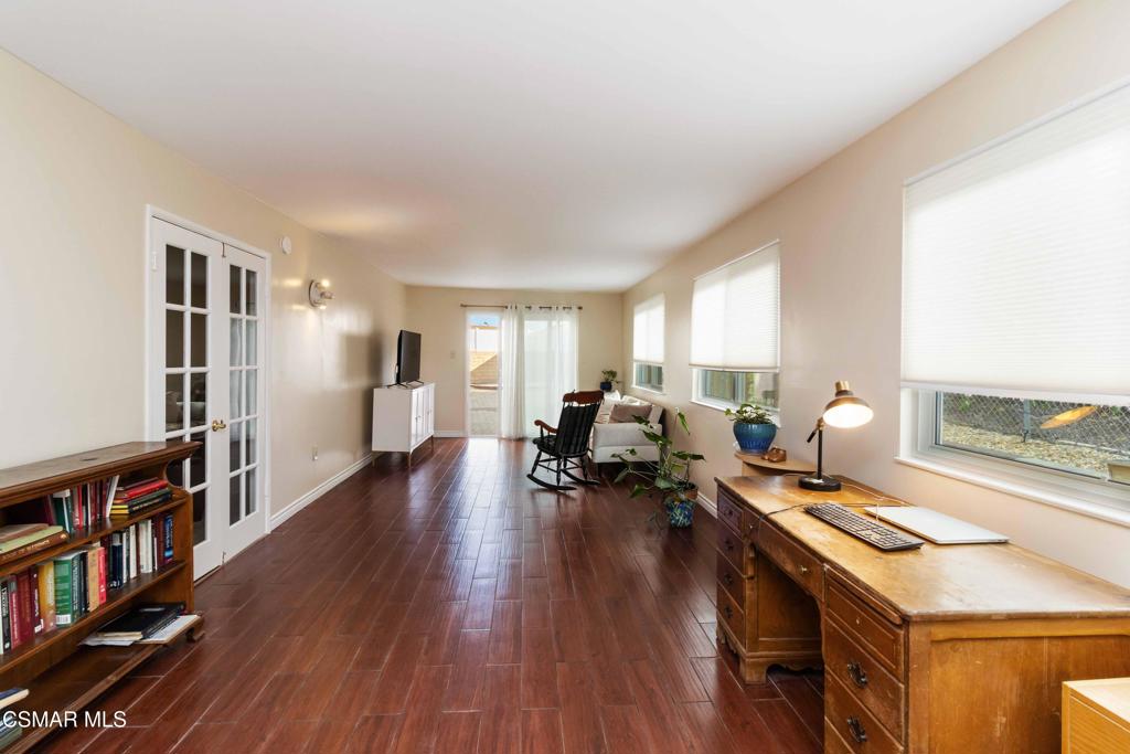 705 Wishard Avenue Simi Valley, CA 93065 - Photo 27 of 50 a living room with furniture and a book shelf