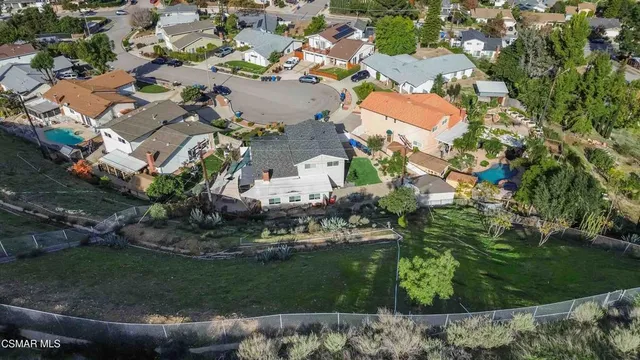 an aerial view of a city with lots of residential buildings