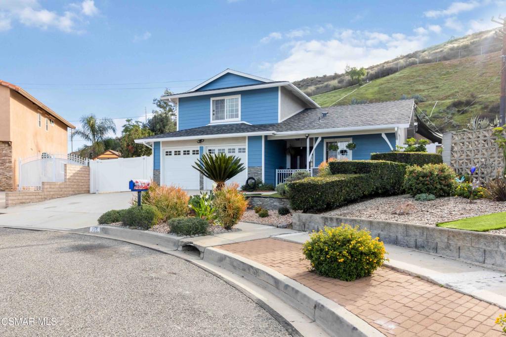 705 Wishard Avenue Simi Valley, CA 93065 - Photo 6 of 50 a front view of a house with garden