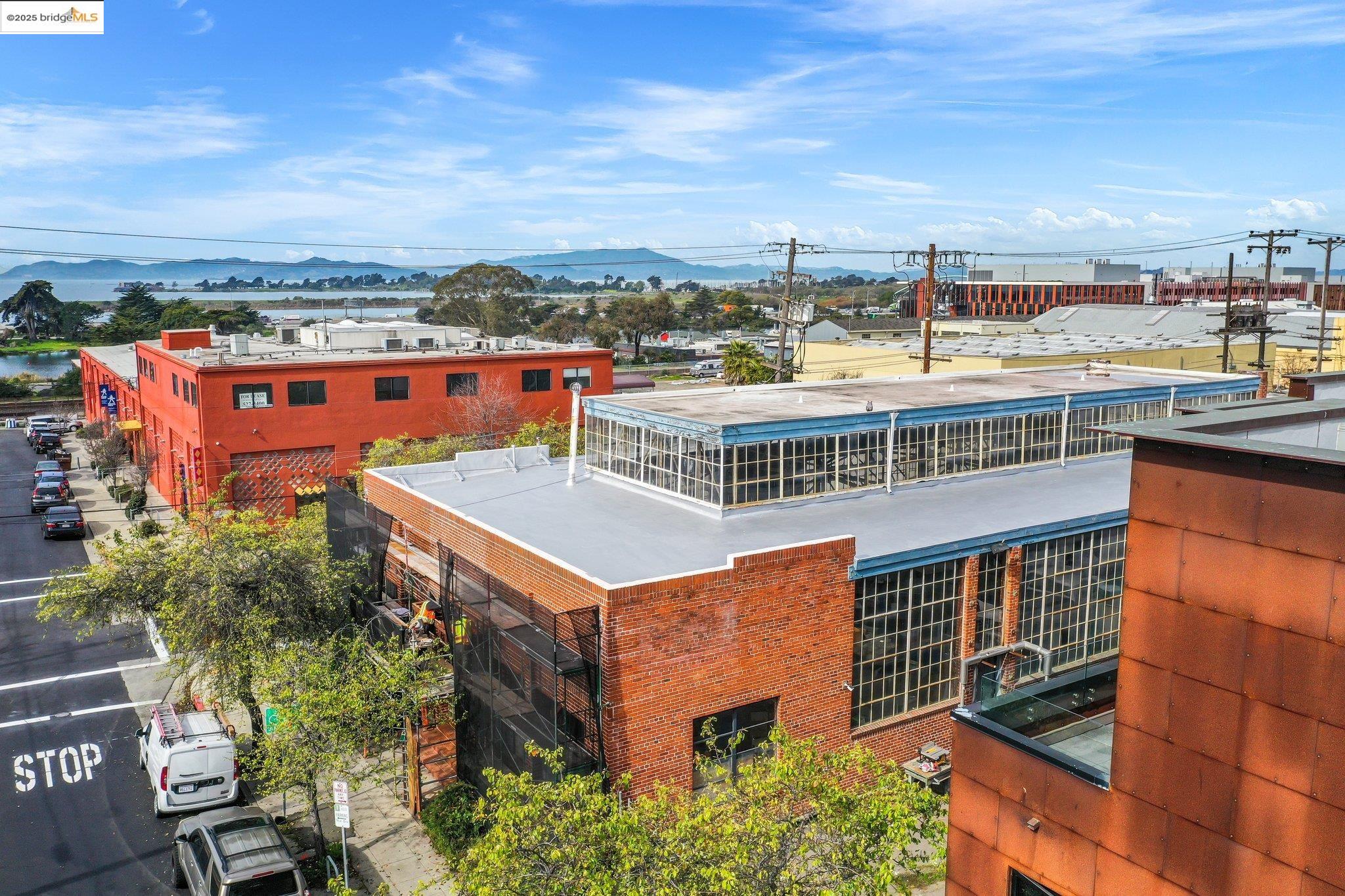 an aerial view of a building with an outdoor space