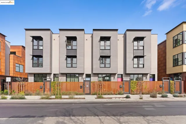 a view of a hallway with wooden shelves
