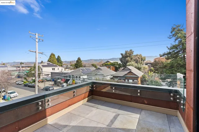 a couple of cars parked in front of a building