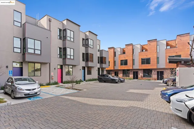 a view of a car park in front of a building