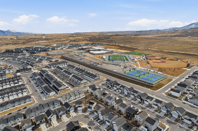 3808 Galatia Road Magna, UT 84044 - Photo 51 of 59 Aerial depiction of a residential community featuring rows of modern homes