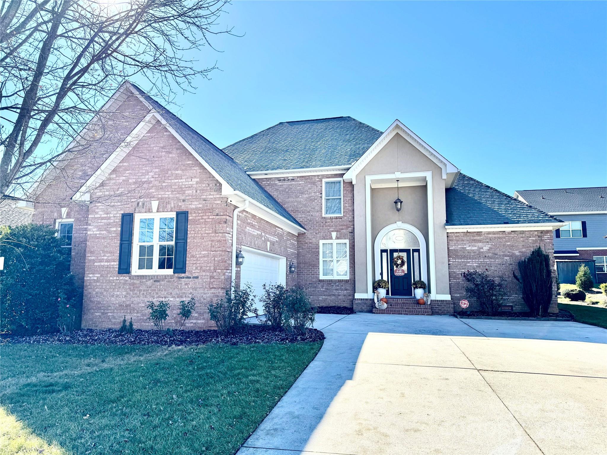 1710 30th Ave Drive Northeast Hickory, NC 28601 - Photo 1 of 44 a front view of a house with garden