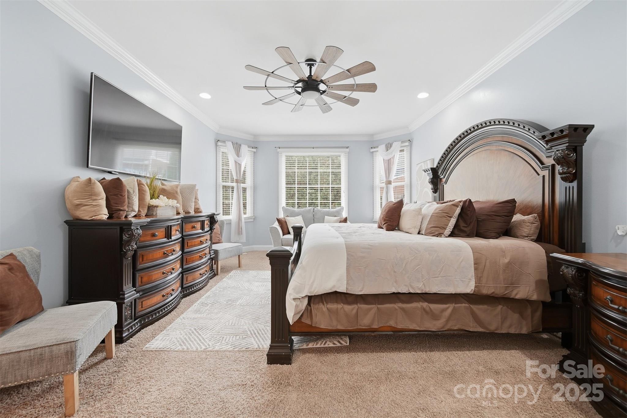 1710 30th Ave Drive Northeast Hickory, NC 28601 - Photo 23 of 44 a bedroom with a bed and a chandelier