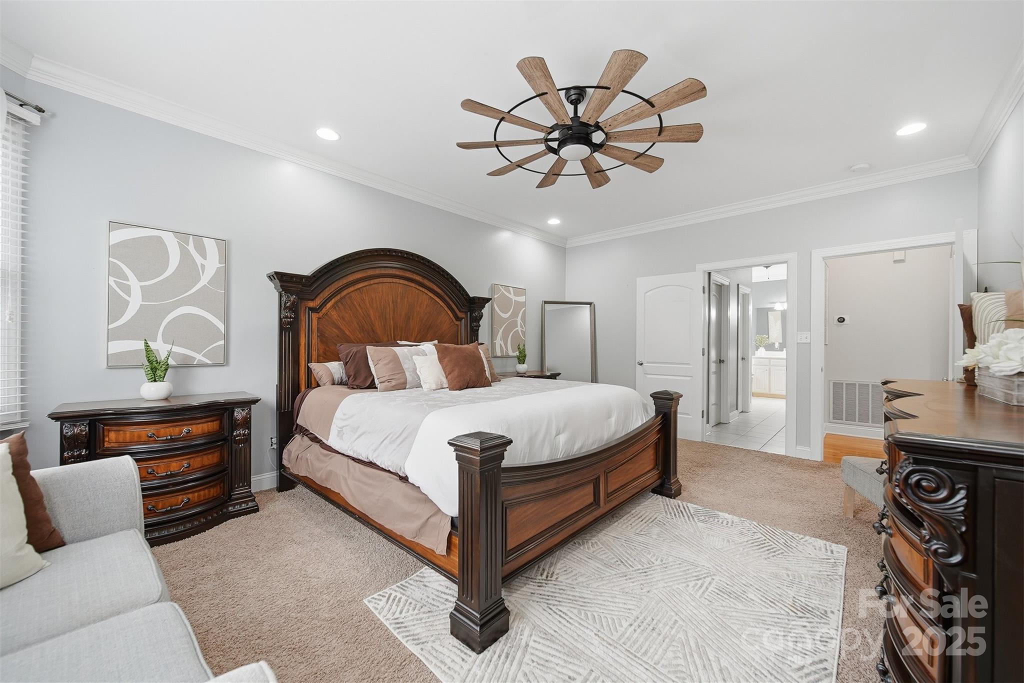 1710 30th Ave Drive Northeast Hickory, NC 28601 - Photo 24 of 44 a bedroom with a bed and a chandelier