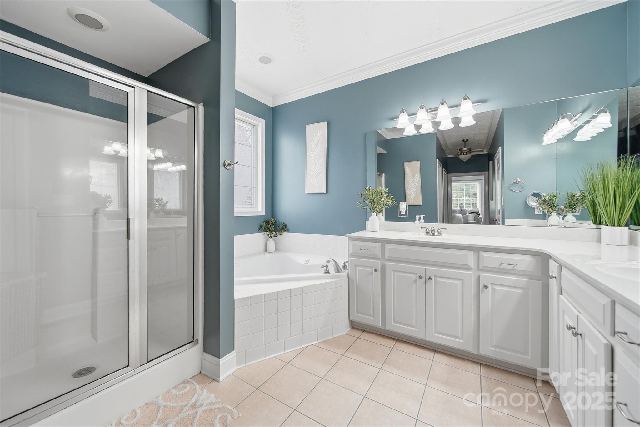 1710 30th Ave Drive Northeast Hickory, NC 28601 - Photo 25 of 44 a spacious bathroom with a shower a sink and a mirror