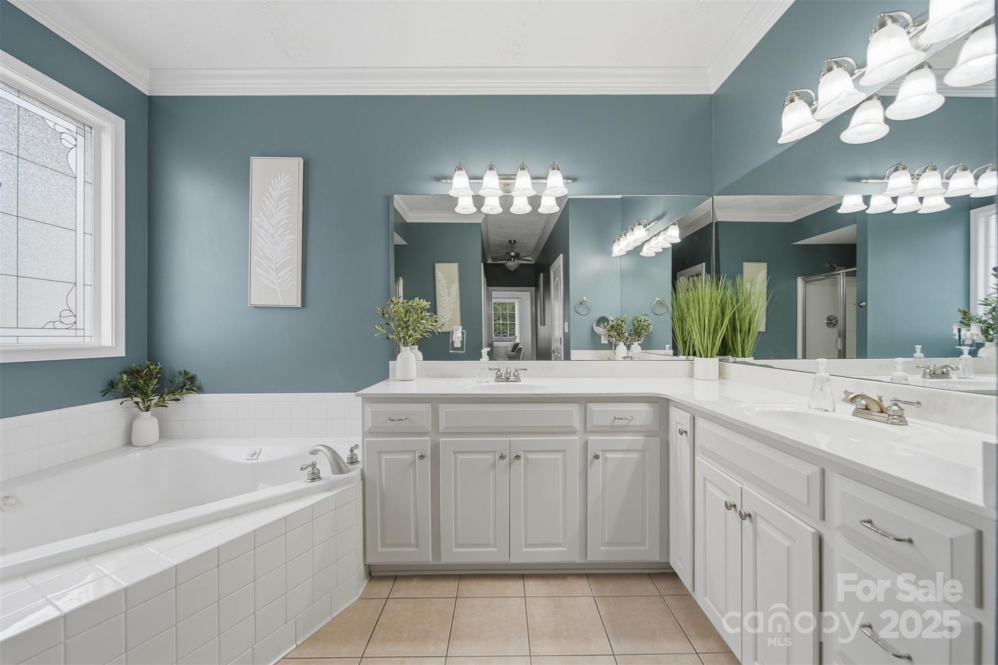 1710 30th Ave Drive Northeast Hickory, NC 28601 - Photo 26 of 44 a bath room with a sink vanity tub shower and a mirror