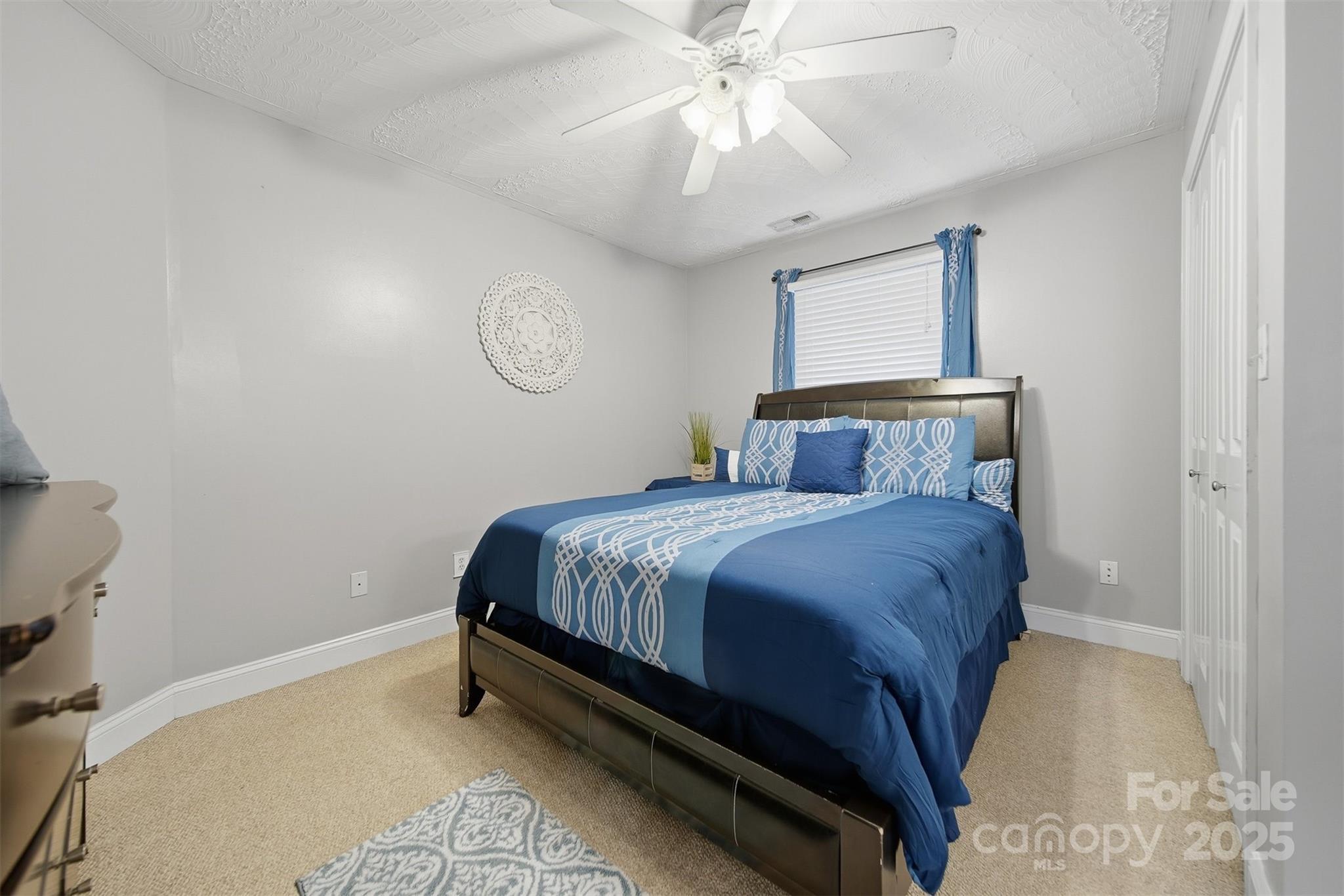 1710 30th Ave Drive Northeast Hickory, NC 28601 - Photo 28 of 44 a bedroom with a bed and window