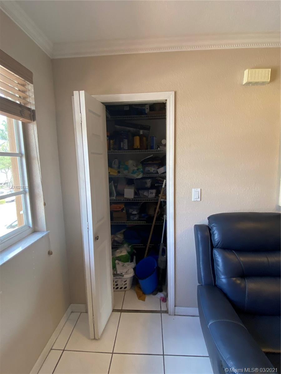 3526 West 76th Street, Unit 203 Hialeah, FL 33018 - Photo 13 of 30 a living room with furniture