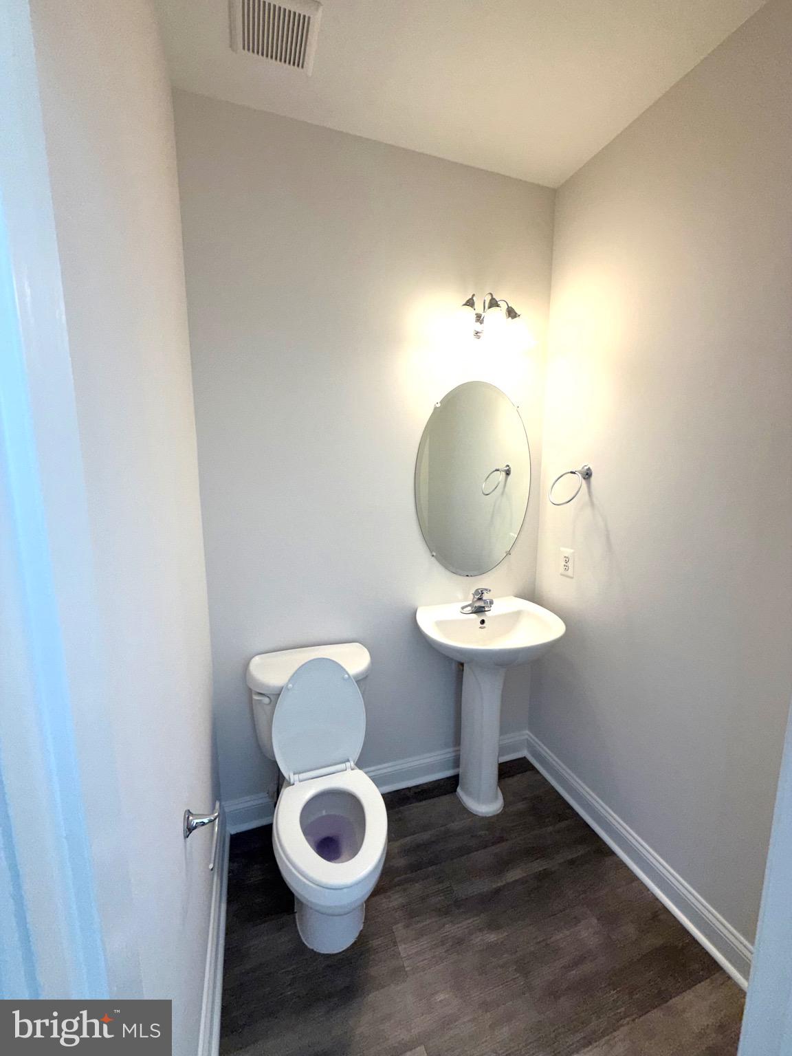 107 A Burck Street, Unit A Frederick, MD 21701 - Photo 14 of 22 a bathroom with a toilet