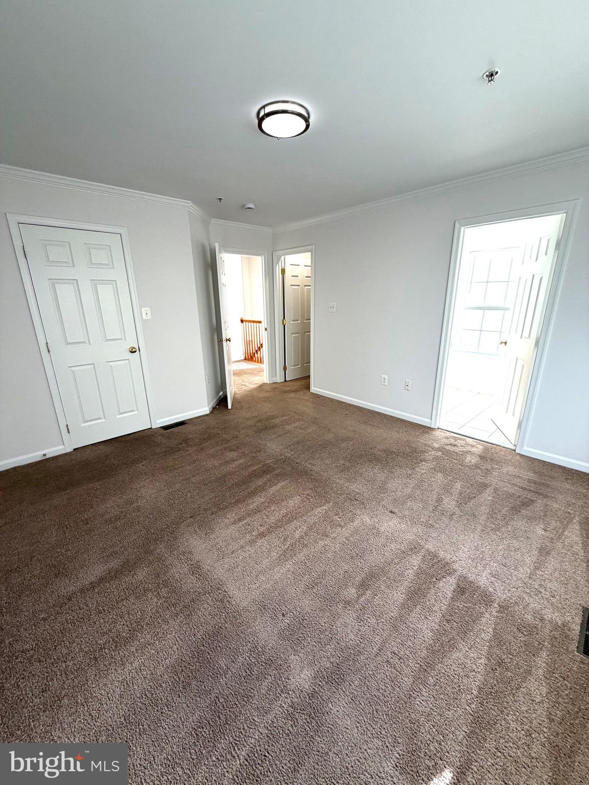 107 A Burck Street, Unit A Frederick, MD 21701 - Photo 20 of 22 a view of an empty room and window