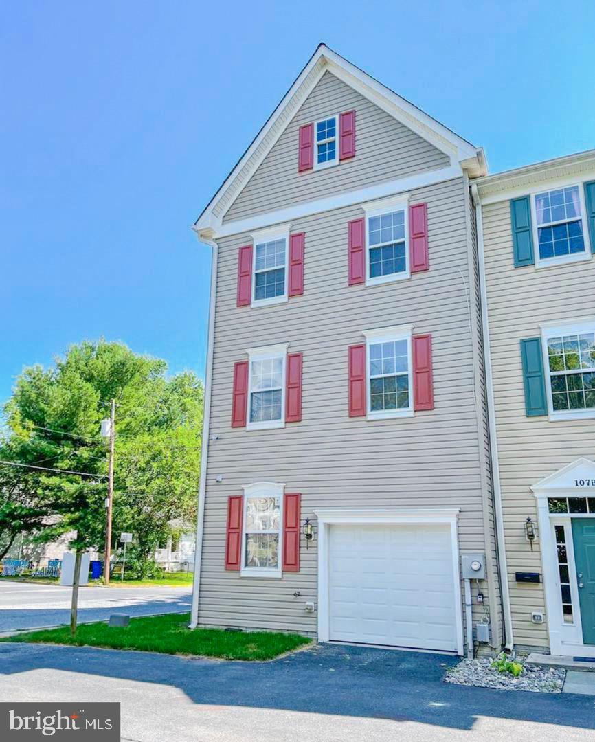 107 A Burck Street, Unit A Frederick, MD 21701 - Photo 2 of 22 a view of a house with a yard