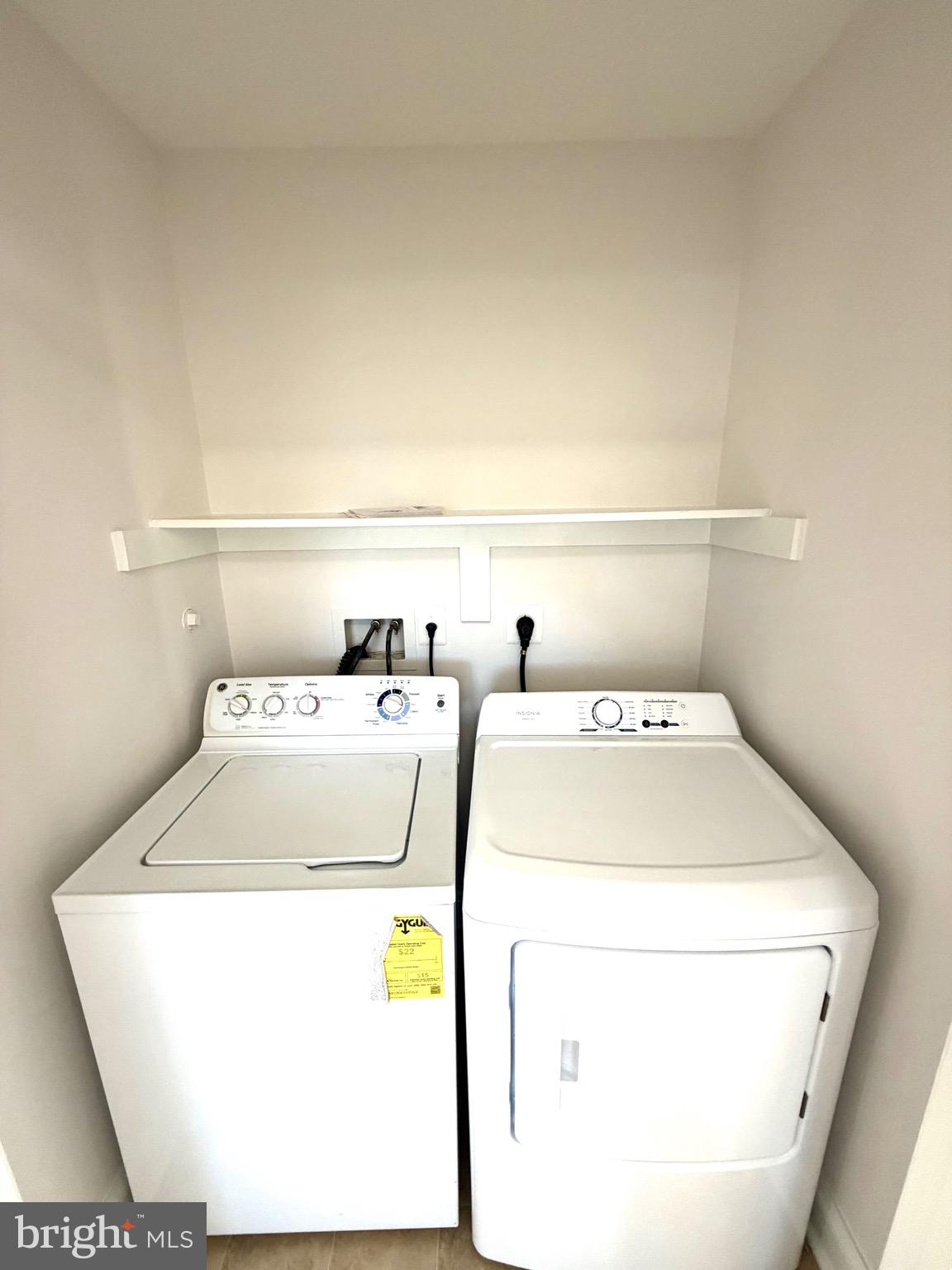 107 A Burck Street, Unit A Frederick, MD 21701 - Photo 5 of 22 a utility room with dryer and washer