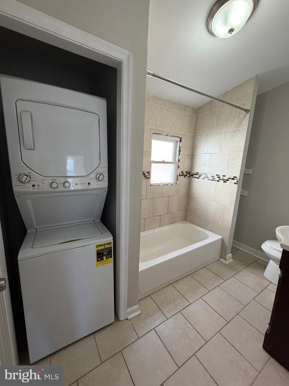 2015 Fernon Street Philadelphia, PA 19145 - Photo 13 of 24 a bathroom with a toilet and a tub