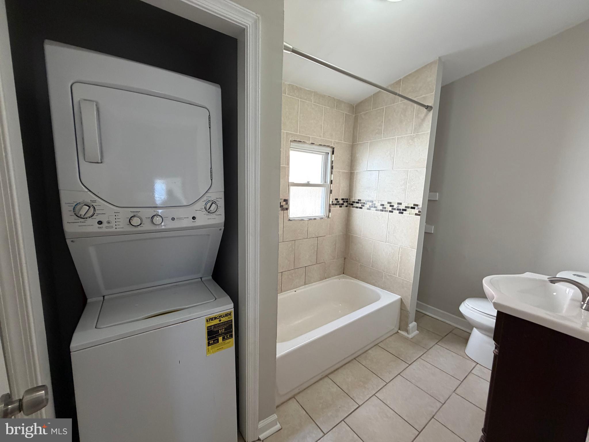 2015 Fernon Street Philadelphia, PA 19145 - Photo 14 of 24 a bathroom with a toilet and a bathtub