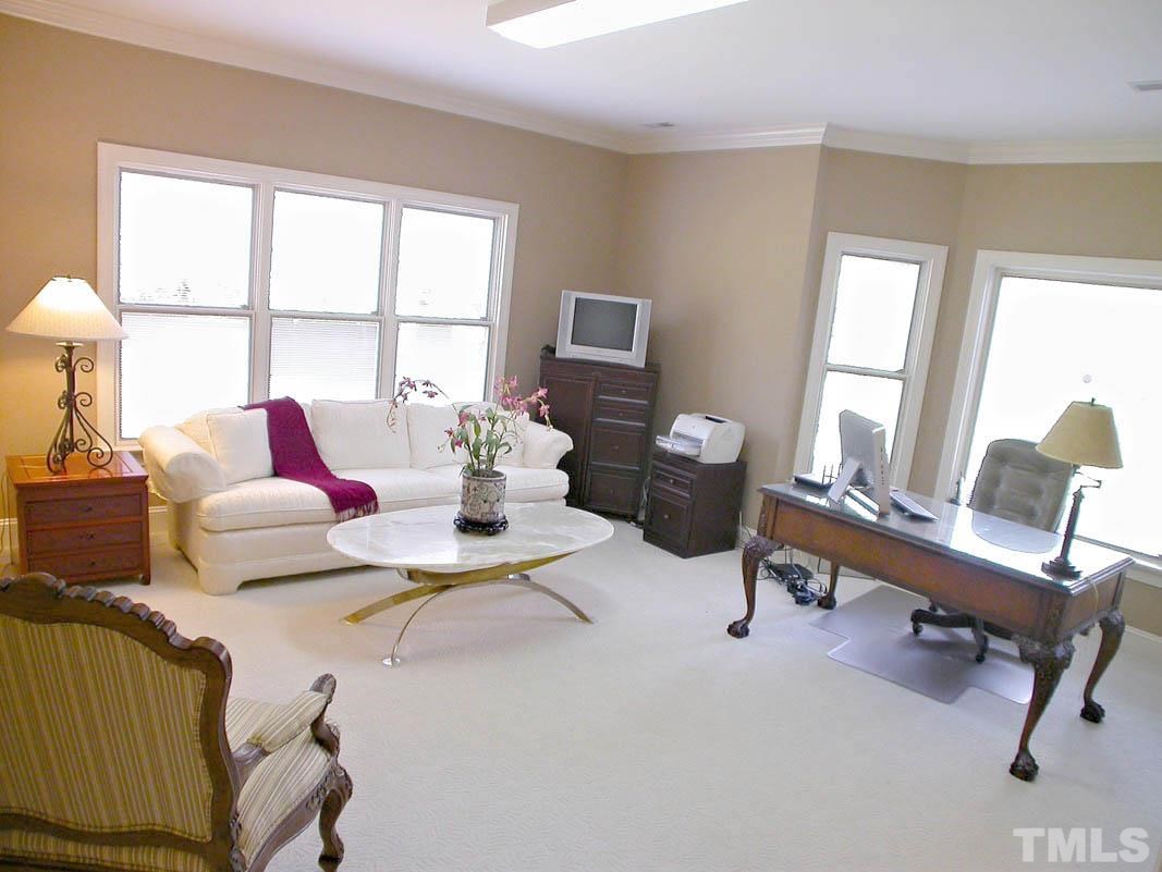 12200 Lockhart Lane Raleigh, NC 27614 - Photo 22 of 25 Lower level bedroom or office with ensuite bath which has been updated with granite countertops and lighting.