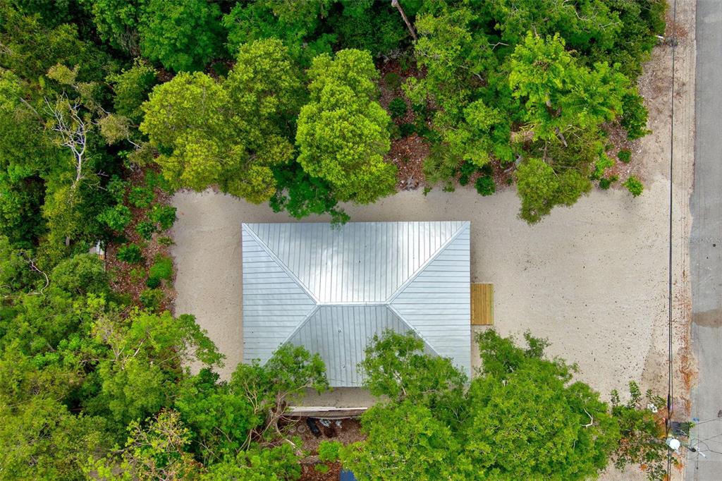 218 Lignumvitae Drive Key Largo, FL 33037 - Photo 30 of 35 an aerial view of a house with plants and trees all around