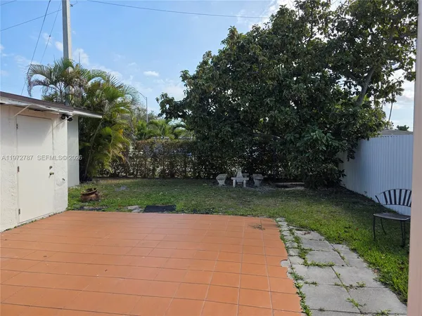 a view of a door in front of a house