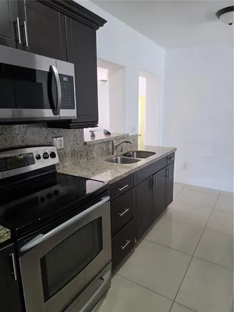 a view of entryway with a bathroom